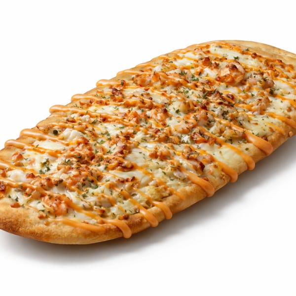 Long flatbread pizza with melted white cheese, diced chicken, orange sauce drizzle, and green herbs.